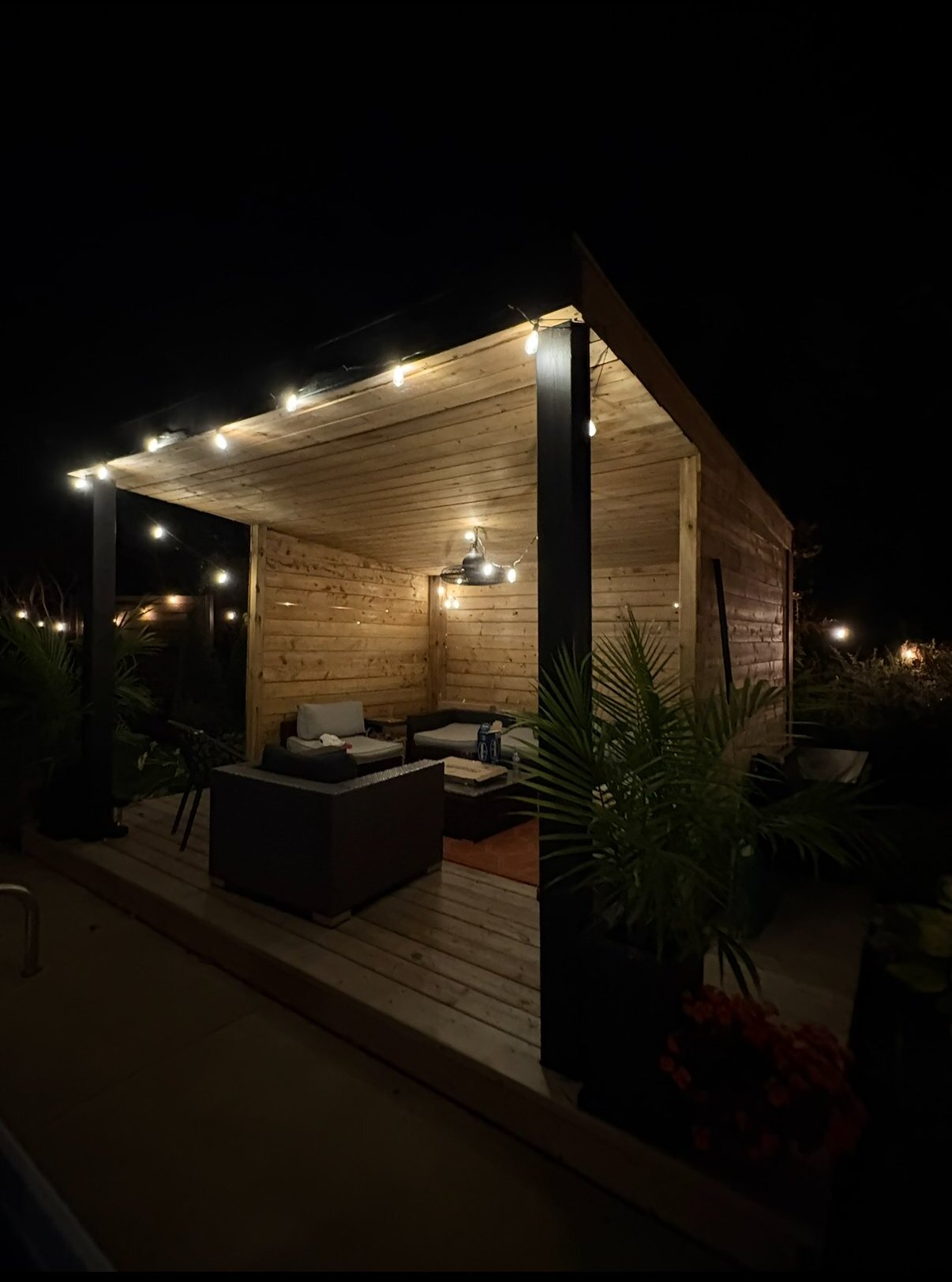 Custom cabana with string lights at night — Pearl Improvements build, GTA