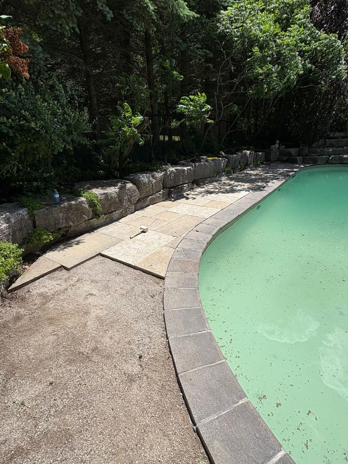 Slabs lifted and the base regraded mid-restoration
